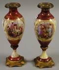 Pair of Viennastyle Metalmounted Genre Scenedecorated Porcelain Garniture Vases