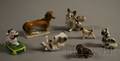Seven Miniature Ceramic Dog Figures
