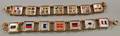 Two 14kt Gold and Painted Glass Nautical Flag Bracelets
