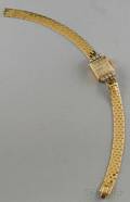 Ladys 14kt Gold and Diamond Tiffany  Co Wristwatch