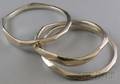 Three Cara Croninger Sterling Silver Bangles