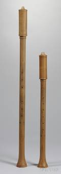 Two Capped Double Reed Wind Instruments