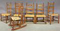 Five Wooden Slatback Side Chairs and a Rocker