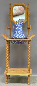 Victorianstyle Oak Mirrored Wash Stand with a Blue and White Floral Transferdecorated Ceramic Pitcher and Basin