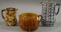 Two Spongeware Pitchers and a Rockingham Glazed Yellowware Batter Pitcher