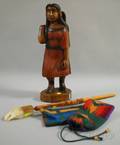Eaglehead Antler Pipe and a Carving of an Indian with a Child in a Cradleboard