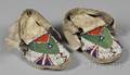 Pair of Native American Plains Childs Moccasins and a Contemporary Fetish Figure