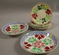 Set of Seven English Handpainted Floraldecorated Staffordshire Plates and a Stickware Plate and Bowl