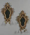 Pair of Carved Giltwood Mirrored Sconces