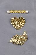 Three Gold Brooches Tiffany  Co Movado