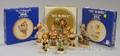 Seven Hummel Ceramic Figures and Three Collectors Plates
