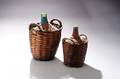 Pair of Glass Wine Jars in Baskets