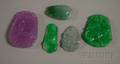 Five Small Jade and Stone Pendants