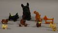 Ten Figural Dogs