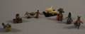 Seven Miniature Bronze and Ivory Items