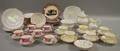 Fifty Pieces of English Pink Lustre Tableware