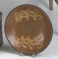 Pennsylvania redware plate mid 19th c