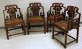 Set of Four 19th Century Chinese Carved Elmwood Armchairs