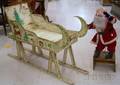 Collection of Assorted Santa Figures and a Paintdecorated Wooden Sleigh