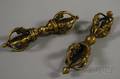 Two Indian Brass Vajras and Four Bronze Deity Figures