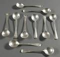 Assembled Set of Ten Irish Georgian Silver Cream Soupspoons
