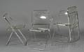 Five Lucite and Chrome Folding Chairs