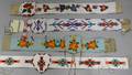 Four BeadedPanel Belts with Pouches