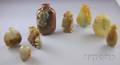 Eight Jade and Stone Carved Snuff Bottles