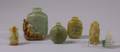 Six Carved Jade and Stone Snuff Bottles
