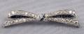 Art Deco Platinum Diamond and Sapphire Bow Brooch Cartier