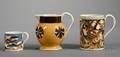 Two Mochaware Mugs and a Small Tobacco Leaf Decorated Jug
