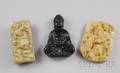 Three Asian Jade and Carved Stone Pendants