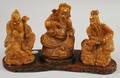 Three Asian Carved Wooden Seated Immortals Figures