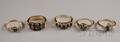 Five Gold Diamond and Green Gemstone Rings