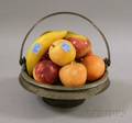 Eleven Pieces of Carved and Painted Stone Fruit in a Victorian Silver Plated Footed Basket