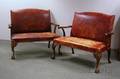 Pair of Georgianstyle Leather Upholstered Carved Mahogany Settees