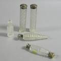Four Silvermounted Colorless Cut Glass Perfume Vials
