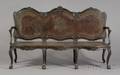 German Rococostyle Carved Walnut and Leather Upholstered Settee