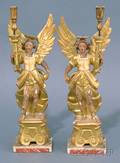 Pair of Italian Baroquestyle Carved and Gilt Gessoed Angelform Candlesticks