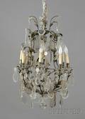 French Rococo Revival Gilded Wroughtiron and Colorless Glass Eight Light Chandelier