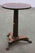 Empire Carved Mahogany and Mahogany Veneer Tilttop Stand with Paw Feet