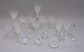 Thirteen Pieces of Waterford Colorless Cut Glass Stemware and Seven Table Items