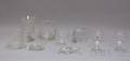 Nine Assorted Colorless Glass Table and Figural Items