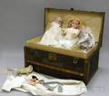 Two German Bisque Head Dolls and a Dolls Trunk with Clothing