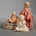 Three Small Bisque Dolls
