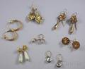 Seven Pairs of Gold and Gemstone Earrings