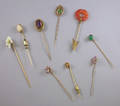 Nine Gold and Gemstone Hardstone and Enamel Stickpins