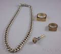 Two 14kt Gold Gentlemans Rings a 9kt Gold Enamel and Gemstone Watch Key and a Silver Watch Chain