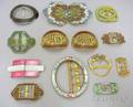 Approximately Thirteen Enamel and Hardstone Buckles