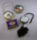 Four Enameled and Painted Ladys Compacts